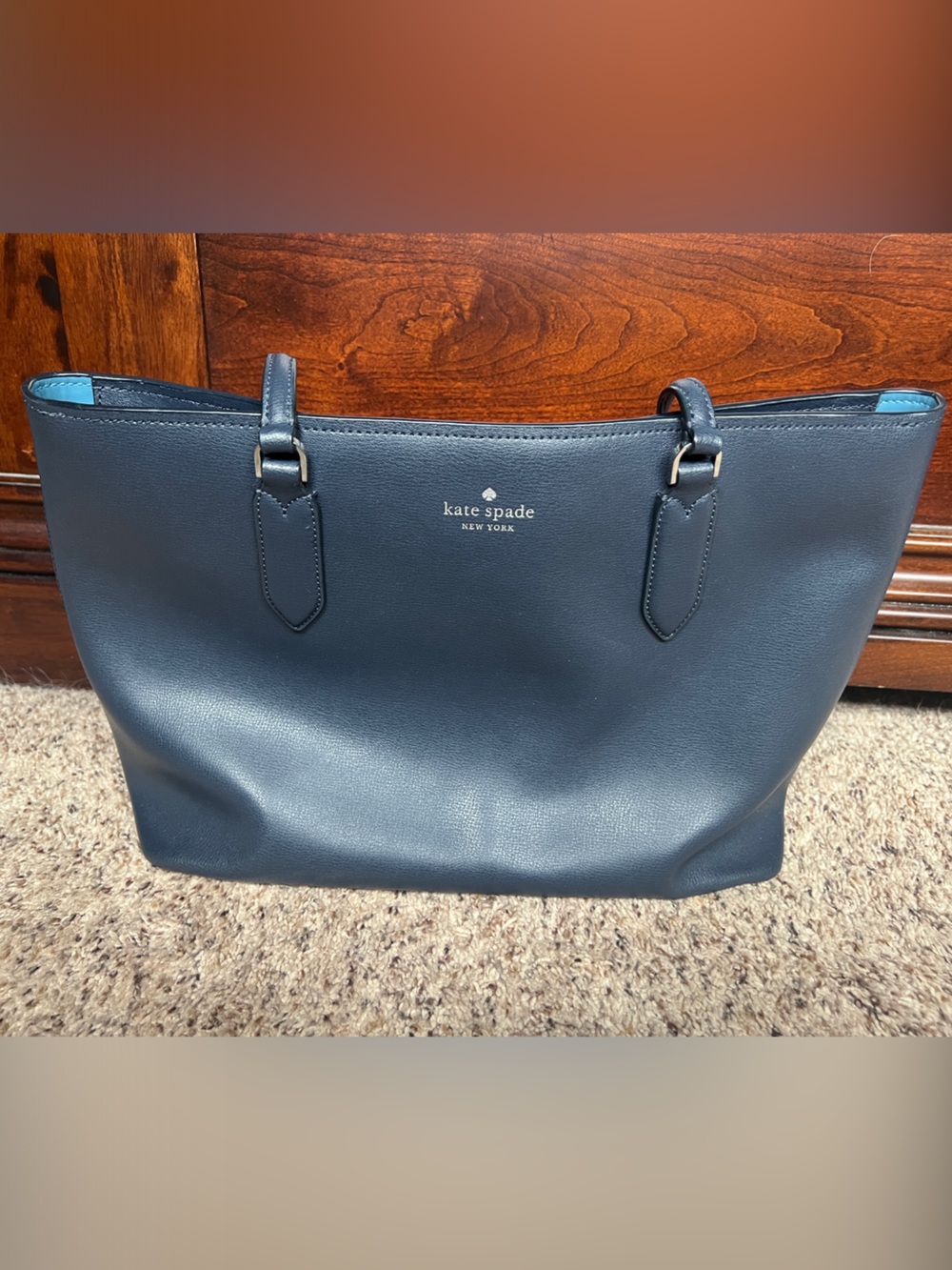 kate spade navy leather tote with lighter blue trim interior